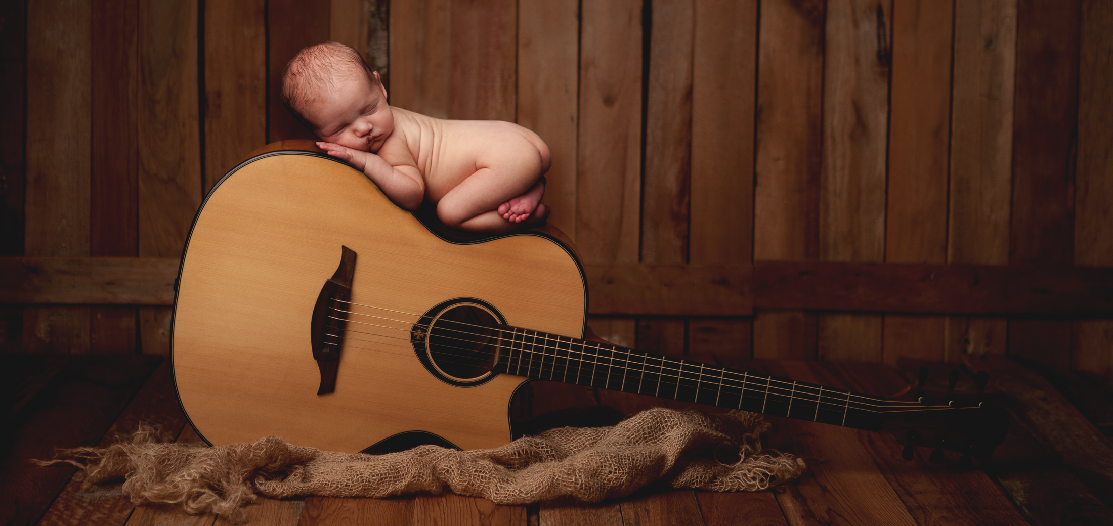 newborn on guitar photo