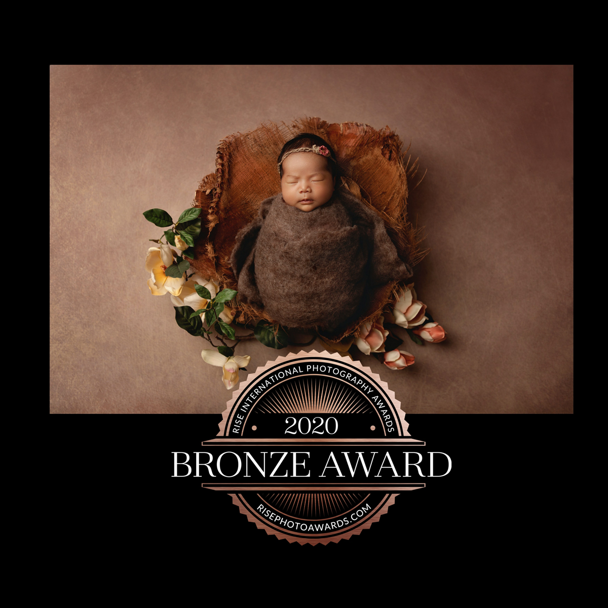 wall display award winning newborn photographer