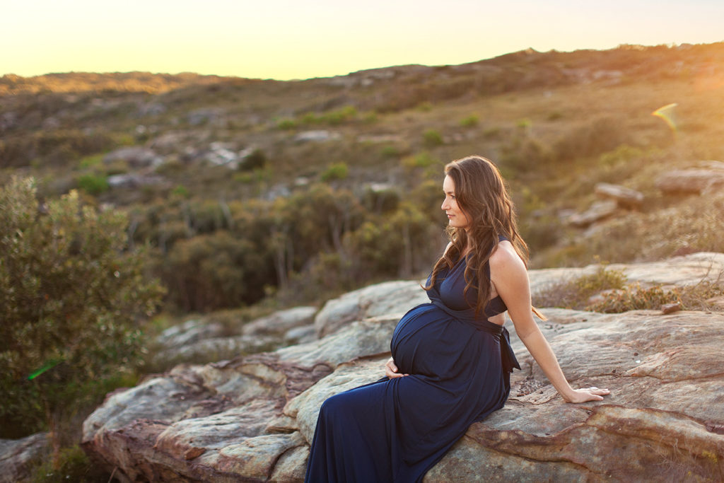 pregnant mum on rocks box head lookout