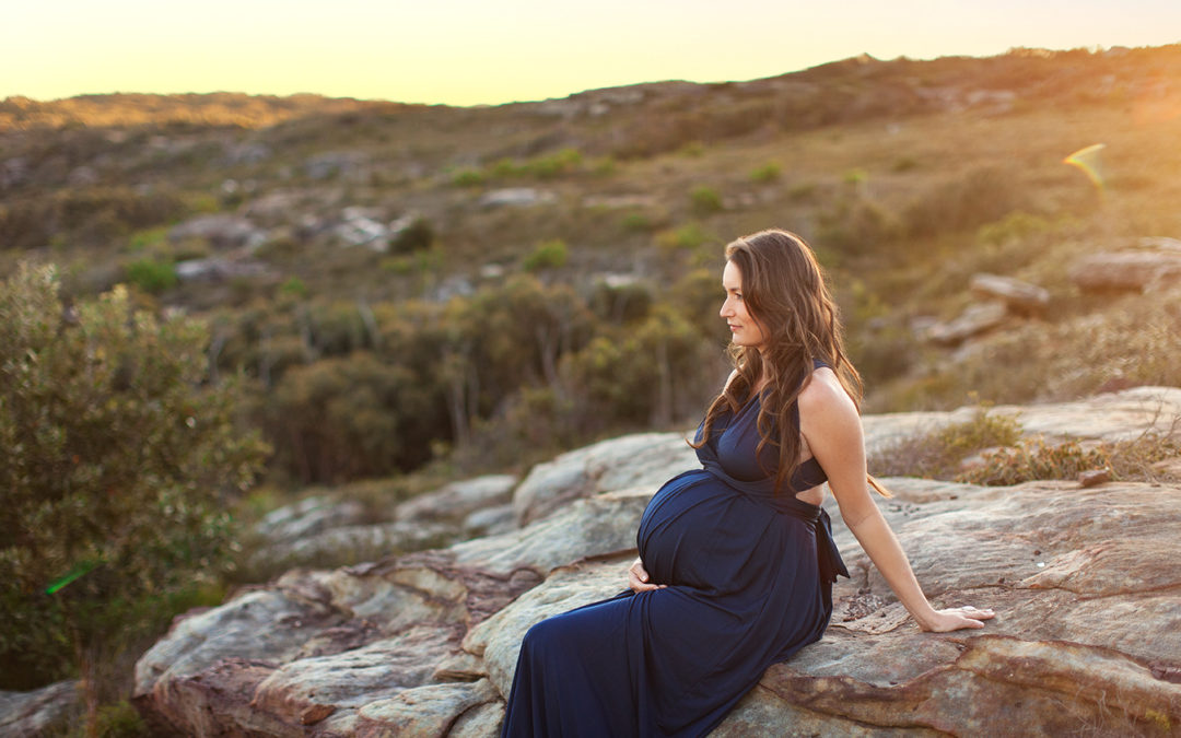 pregnant mum on rocks box head lookout